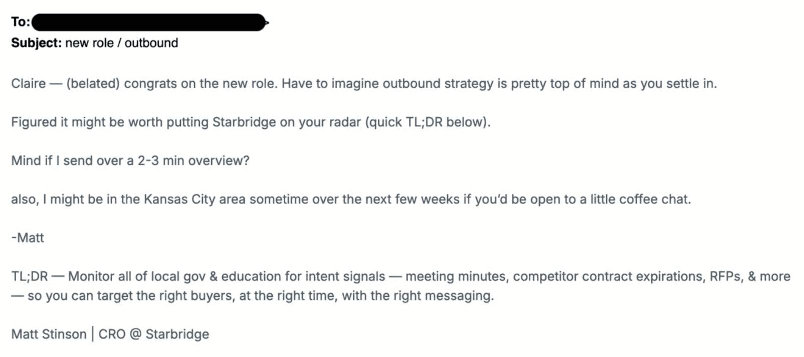 Screenshot of an example cold outbound email with a blacked-out recipient line and the subject 'new role / outbound.' A short first-touch note from Matt Stinson, CRO at Starbridge, congratulates a prospect named Claire on a new role, asks to send a 2–3 minute overview, offers a Kansas City coffee chat, and closes with a TL;DR: monitor all of local government and education for intent signals — meeting minutes, competitor contract expirations, and RFPs — to target the right buyers at the right time with the right messaging.